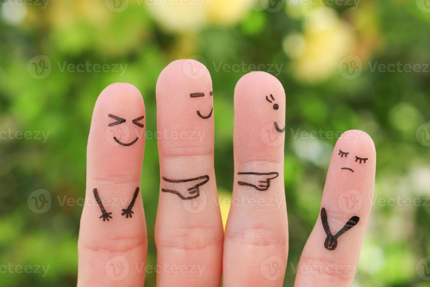 Fingers art of people. Concept children bullying their classmate. photo