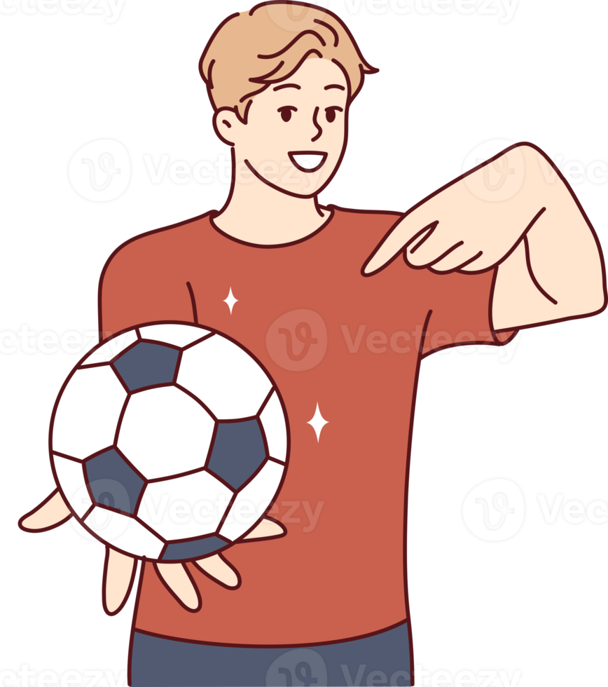 Young man holds soccer ball and points finger at it, offering to play football png