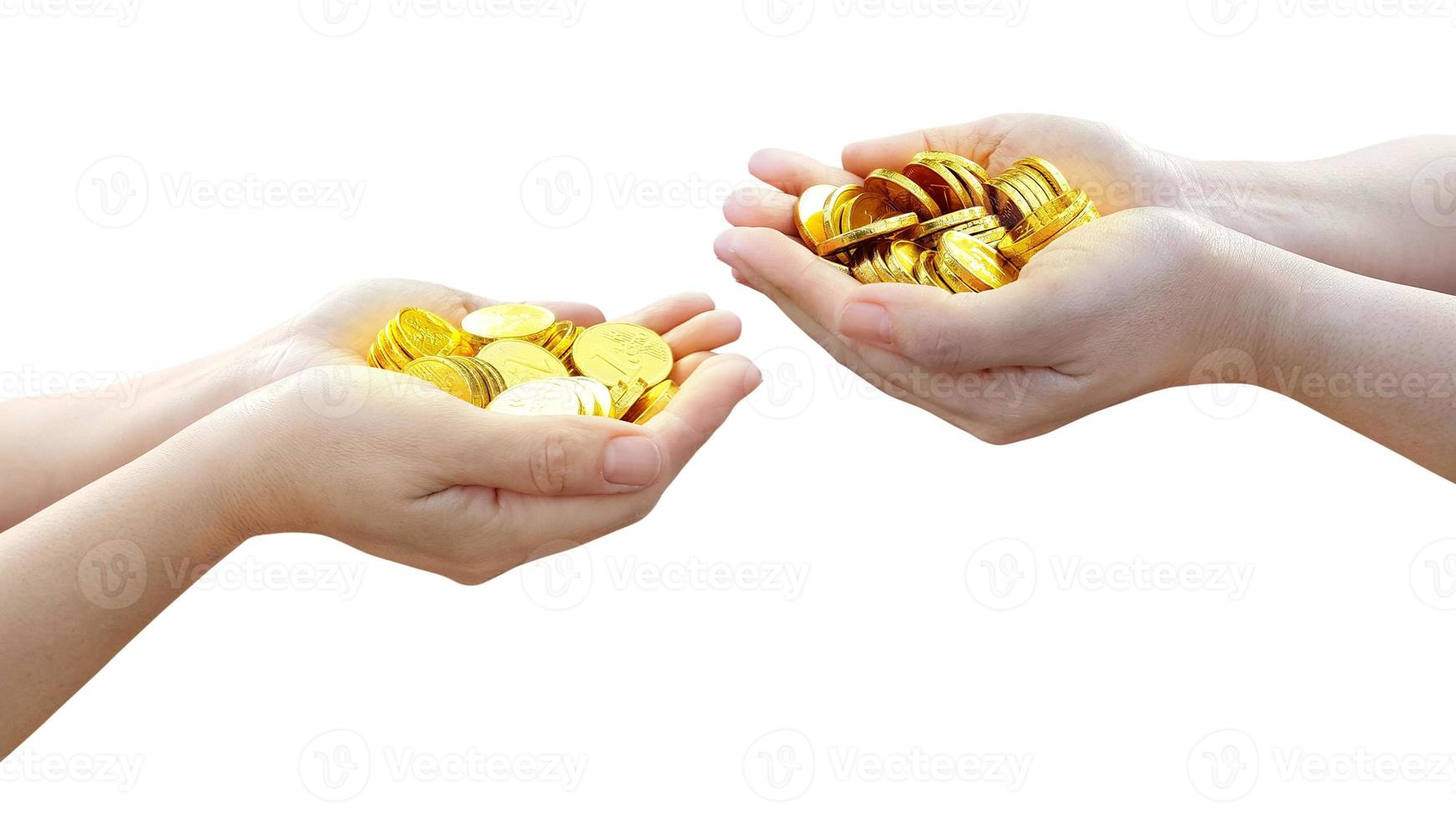 Gold coin in woman's hand holding isolated on white photo