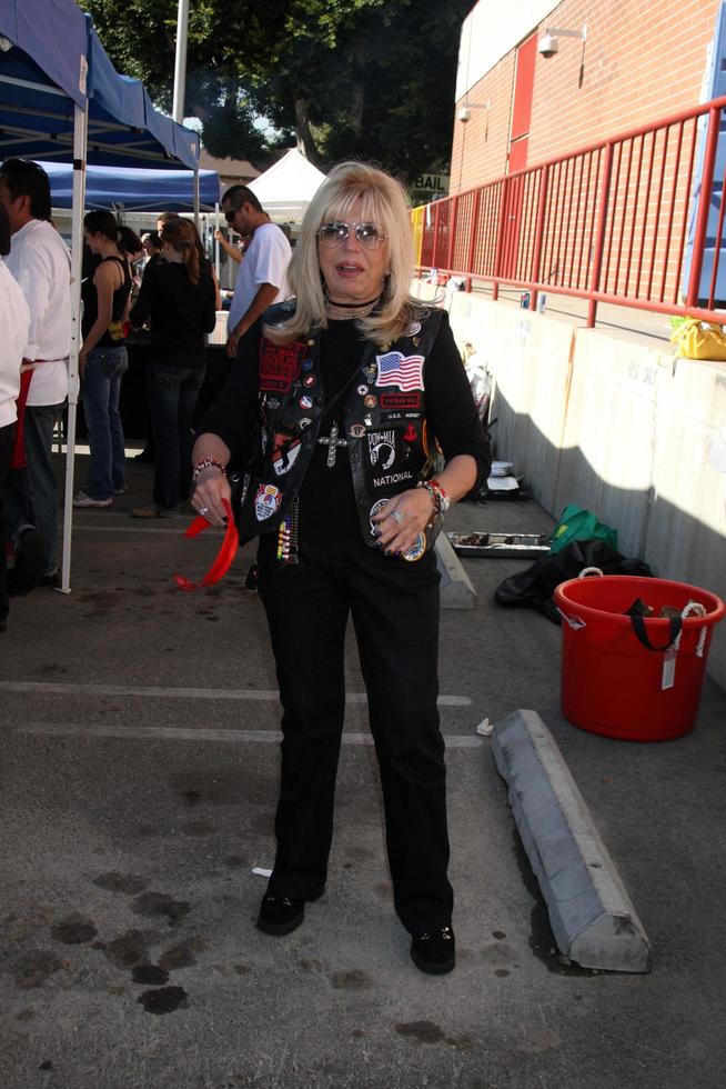 Nancy Sinatraat the Hollywood Chamber of Commerce Police  Fire Appreciation LuncheonHollywood Police Station WilcoxLos Angeles  CANovember 24 20092009 photo