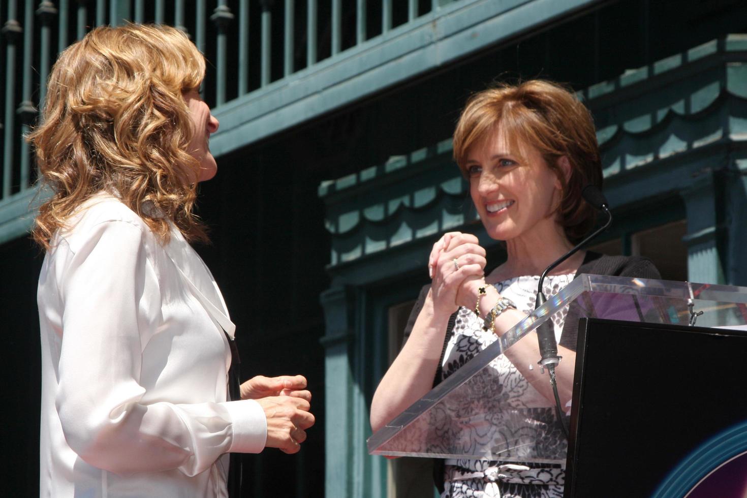 Marlee Matlin Anne Sweeney  attending the Hollywood Walk of Fame Ceremony for Marlee Matlin on Hollywood Boulevard in Los Angeles CA  on May 6 20092009 photo