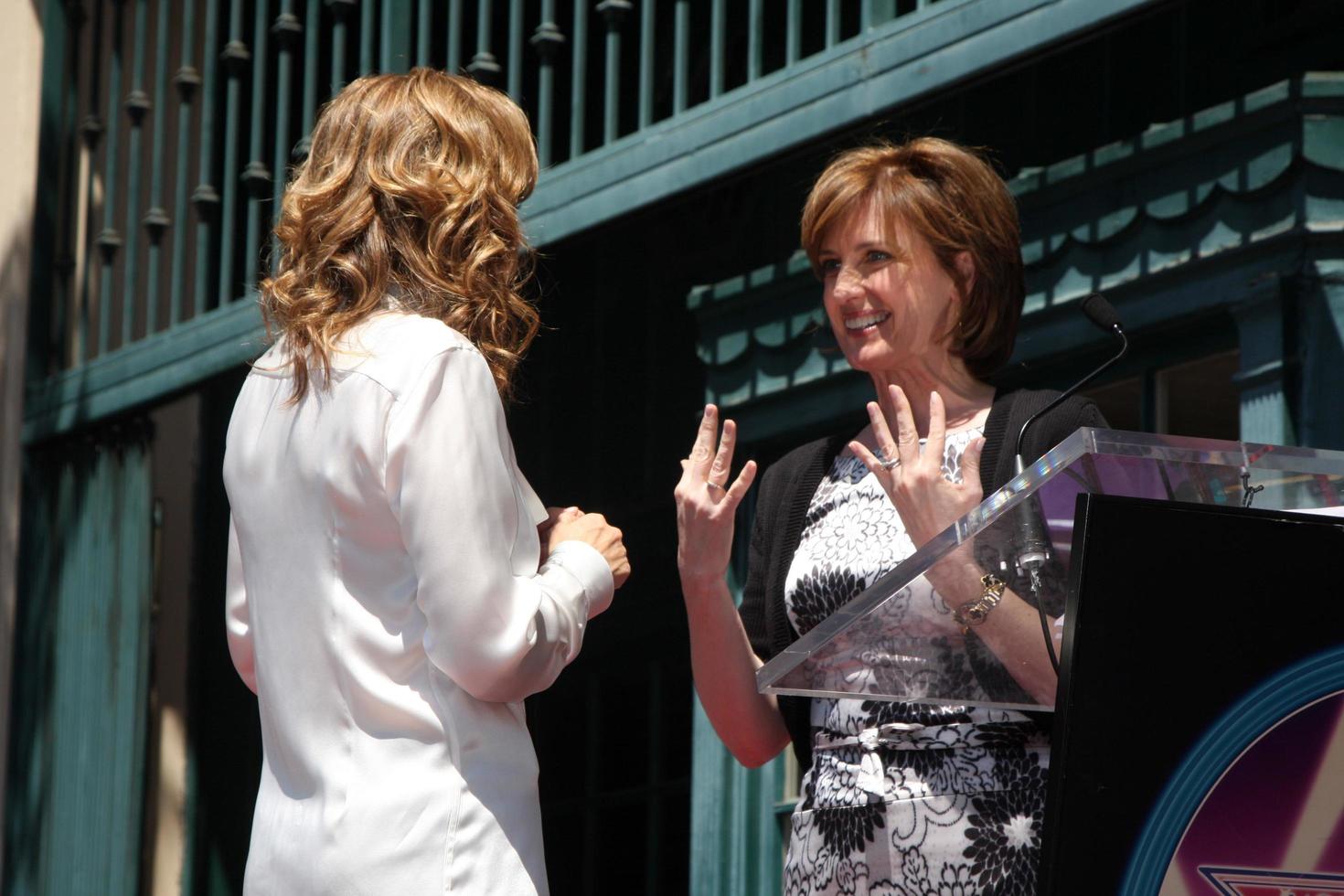 Marlee Matlin Anne Sweeney  attending the Hollywood Walk of Fame Ceremony for Marlee Matlin on Hollywood Boulevard in Los Angeles CA  on May 6 20092009 photo
