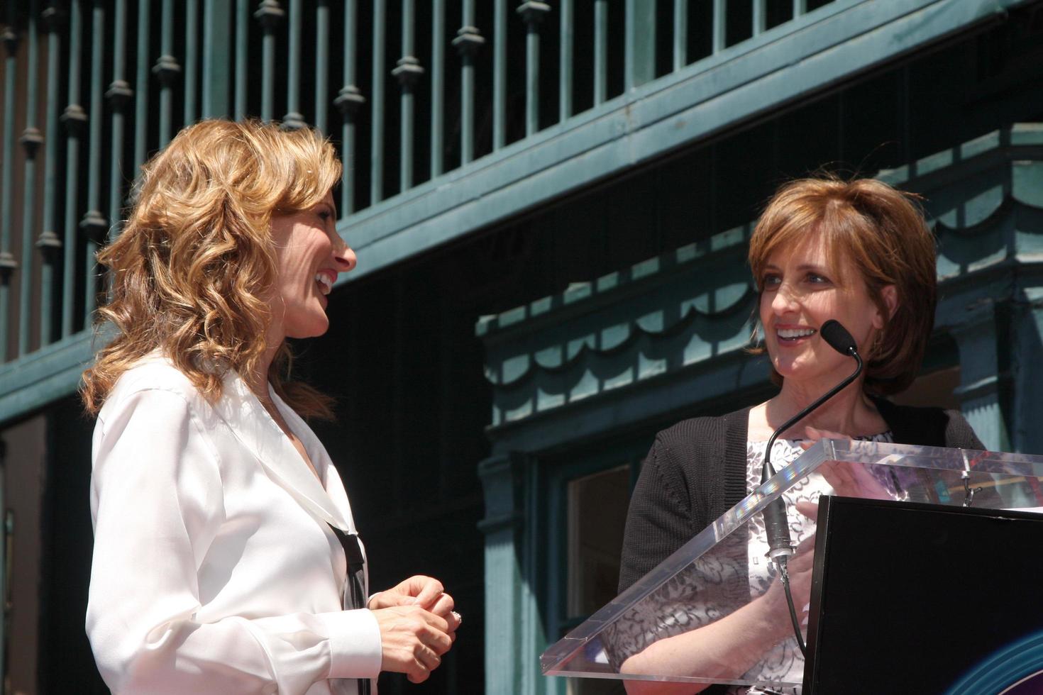 Marlee Matlin Anne Sweeney  attending the Hollywood Walk of Fame Ceremony for Marlee Matlin on Hollywood Boulevard in Los Angeles CA  on May 6 20092009 photo