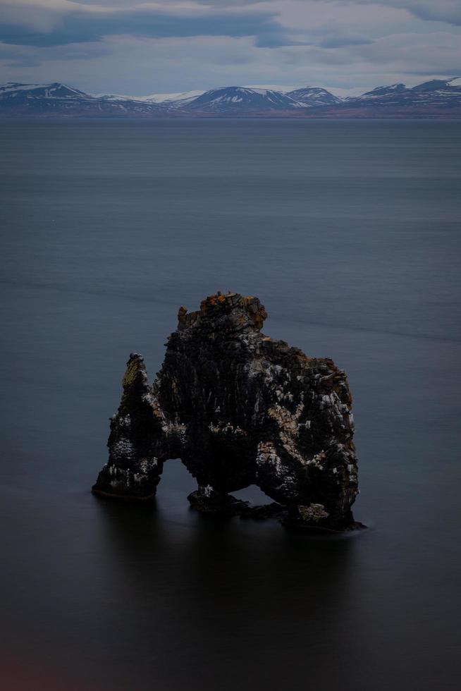 Elephank like natural rock formation in the ocean in iceland photo