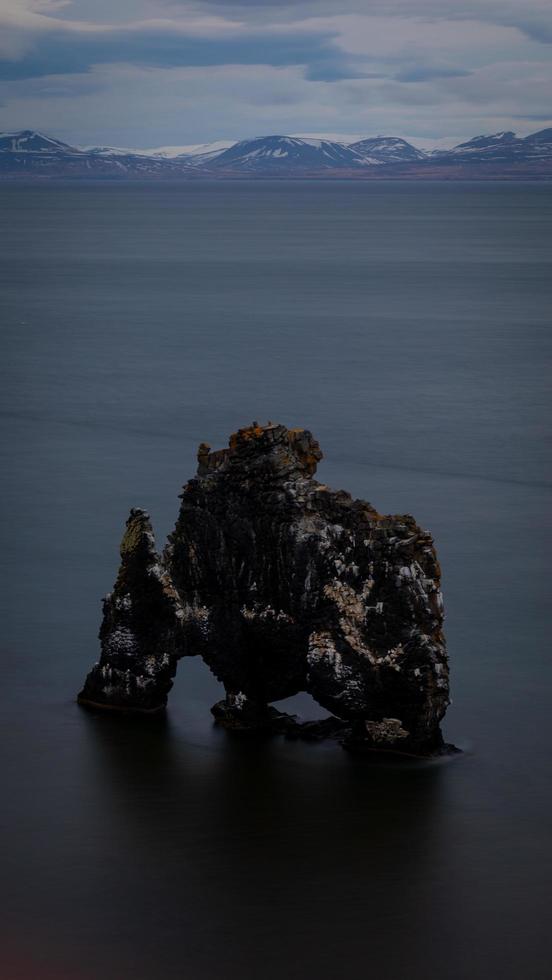 Elephank like natural rock formation in the ocean in iceland photo