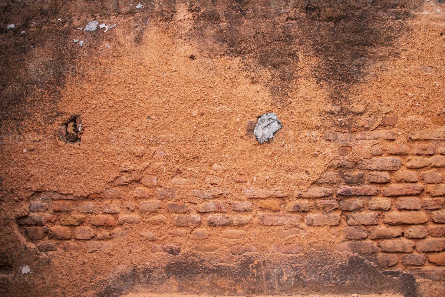 antiguo ladrillo pared rojo yeso textura lata ser usado como un antecedentes fondo de pantalla foto