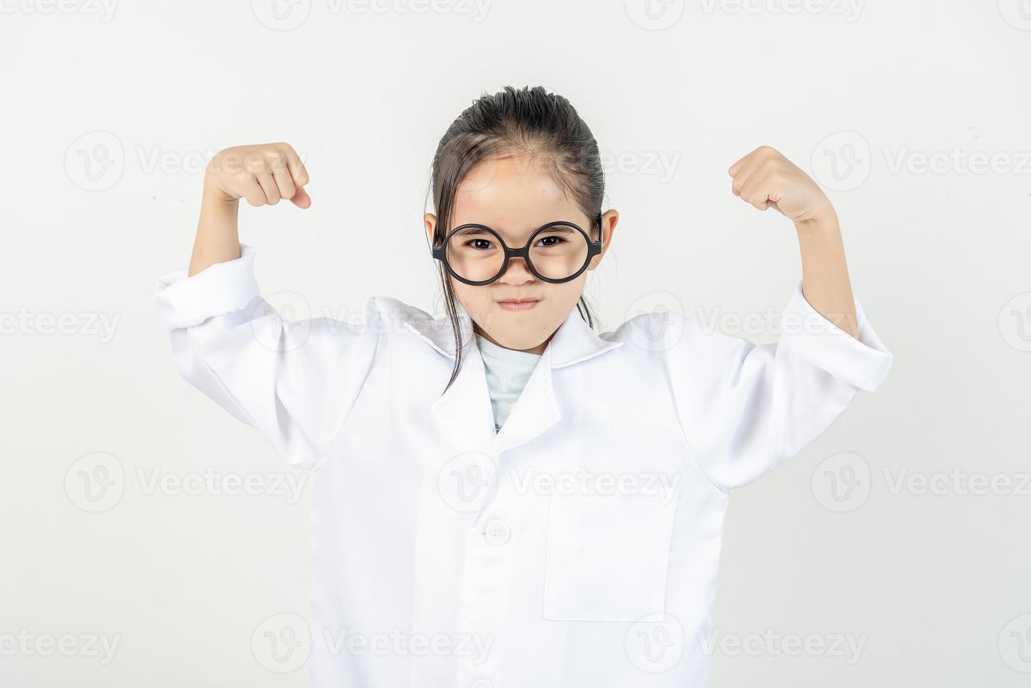 smart doctor Little Girl with white medical coat photo