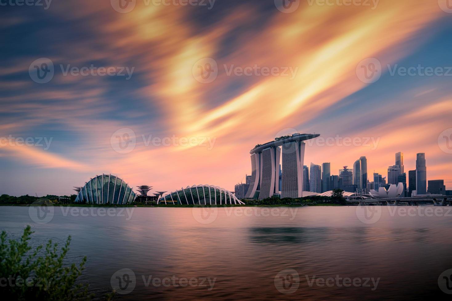 Skyline and view of skyscrapers at sunset in Singapore. photo