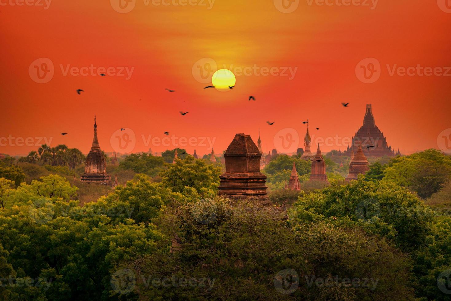 Landscape image of Ancient pagoda at sunset in Bagan, Myanmar. photo