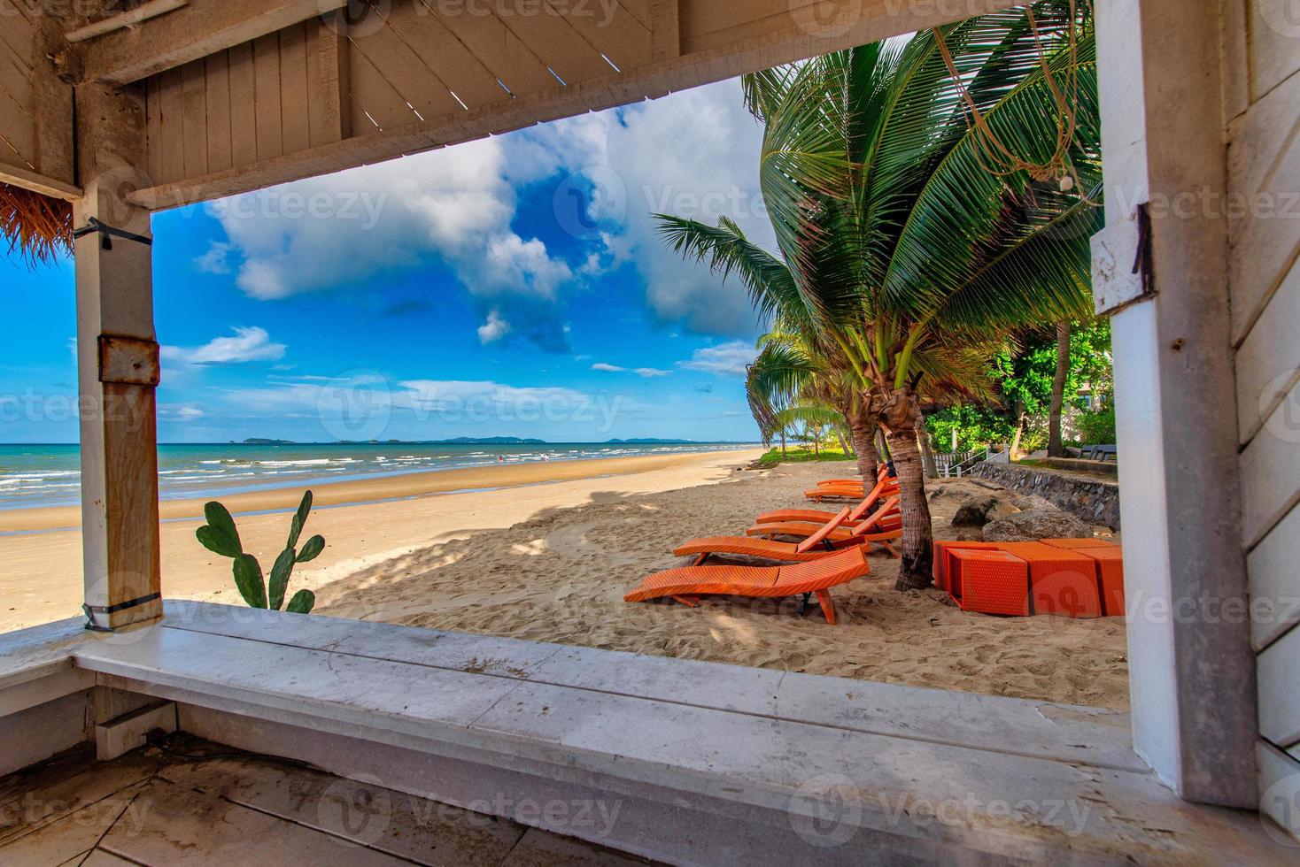 Sea view from beach bar with chair beach at summer day photo