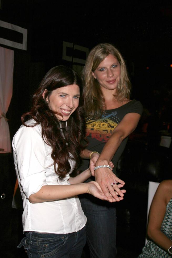 Heather Matarazzo and her Fiance Carolyn Murphy looking at rings and jewelry at  the GBK Same Sex in The City  Wedding Show in Los Angeles CA onAugust 17 20082008 photo