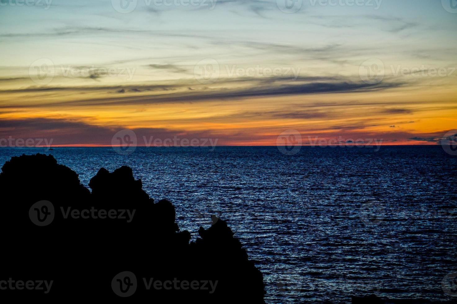 Sunset over the sea photo