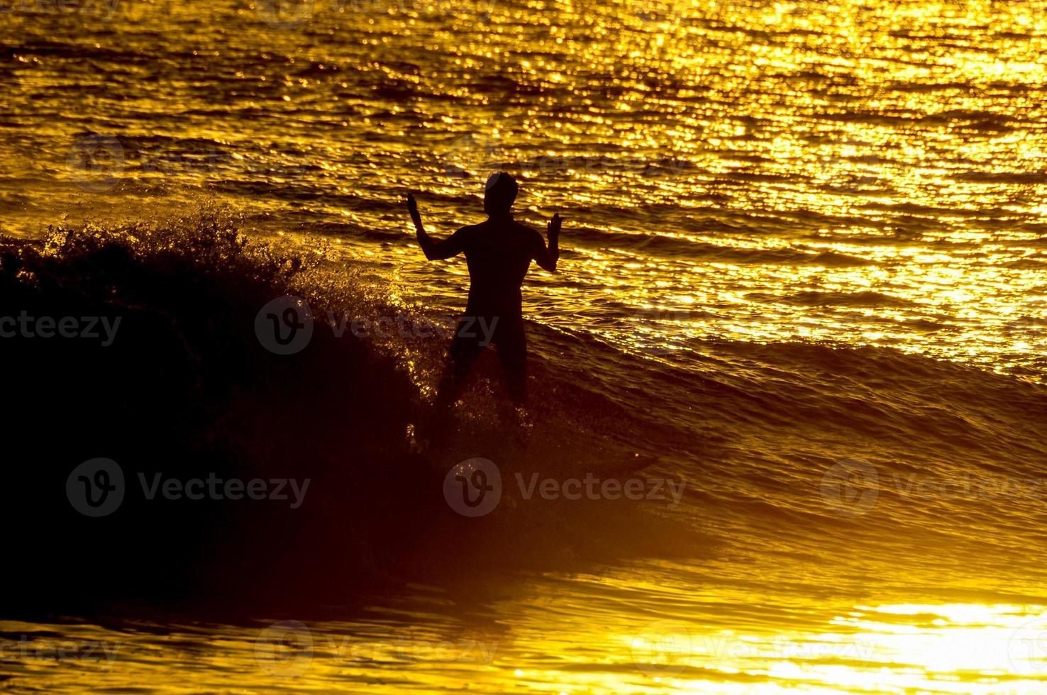 Kitesurfer at sunset photo