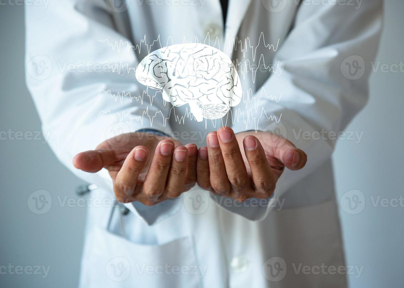 Brain illustration and doctor hands. Healthcare concept. photo