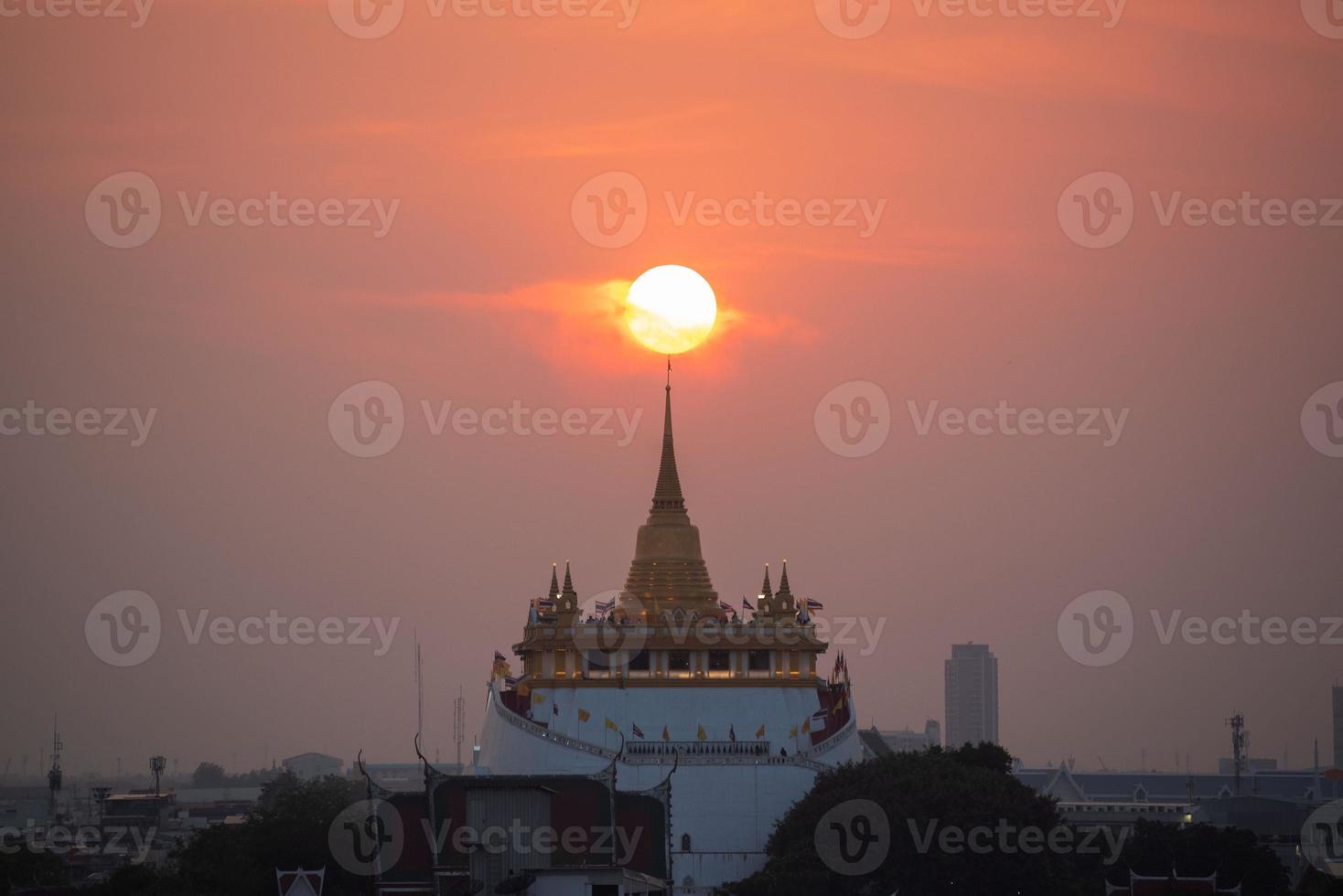 Beautiful sunset at golden mount temple photo