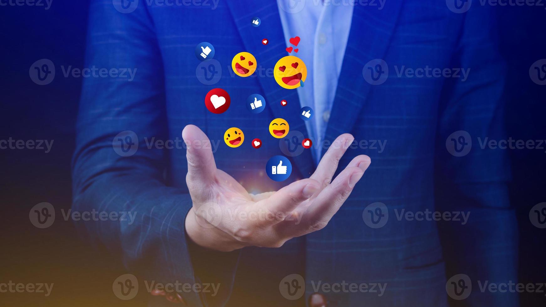 Social media and online digital concept, Businessman using  sending emojis with social media. People using and digital online marketing concepts photo