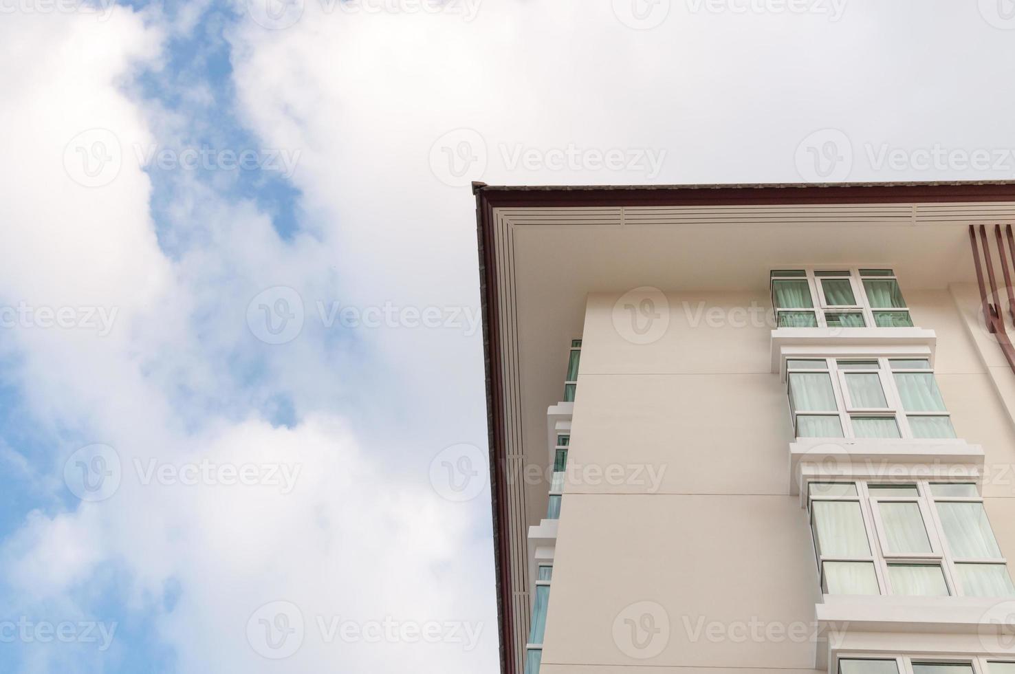 Modern building on blue sky background photo