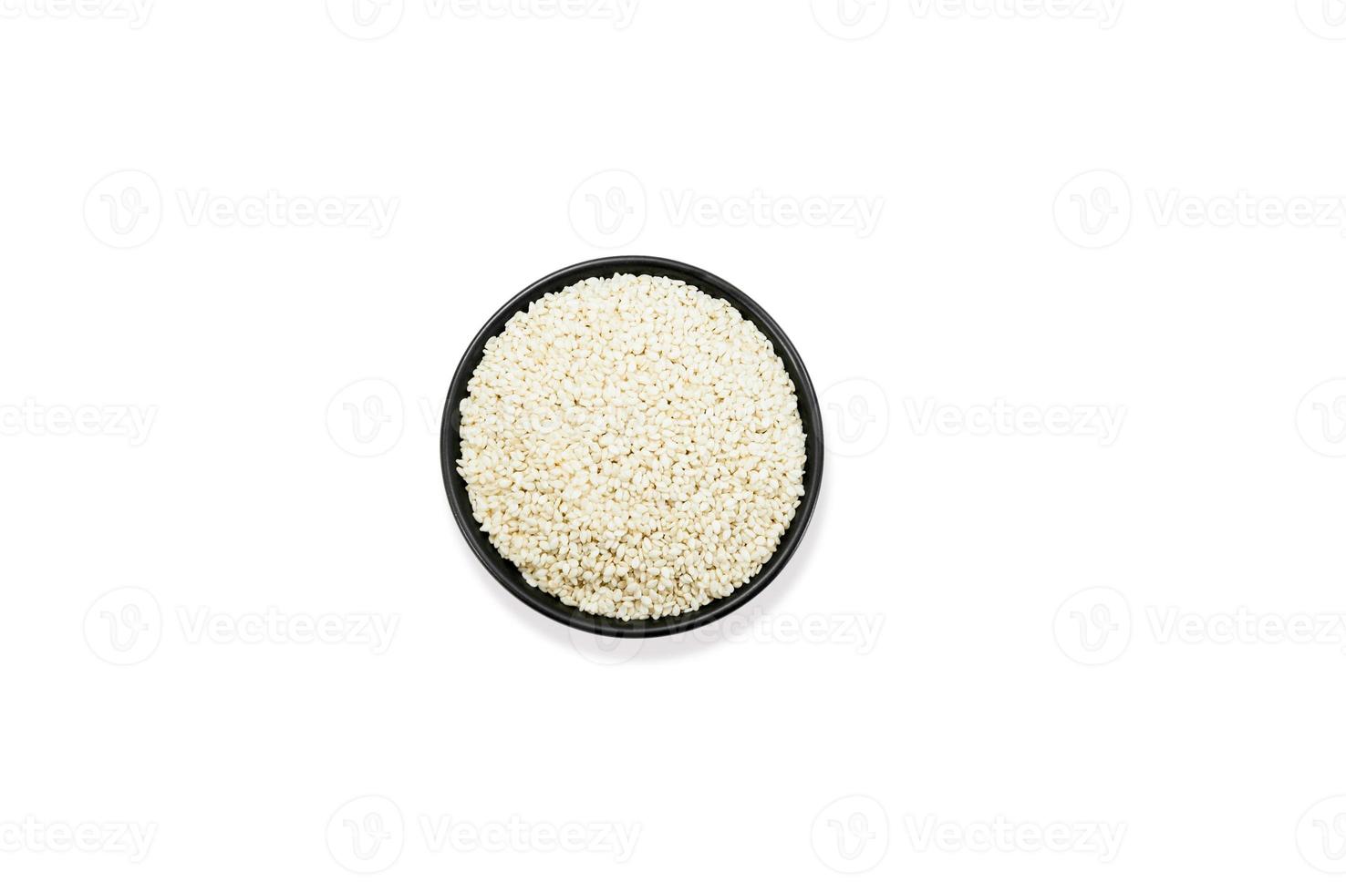 Organic White Sesame seed in a black cup isolate on white background,top view photo