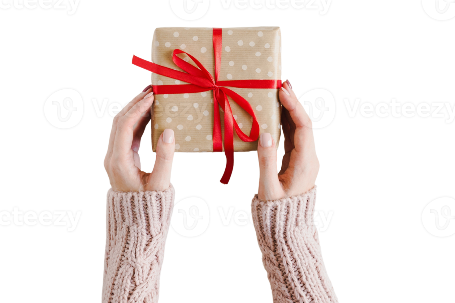 Beige gift box held by a woman's hands isolated on a transparent background png