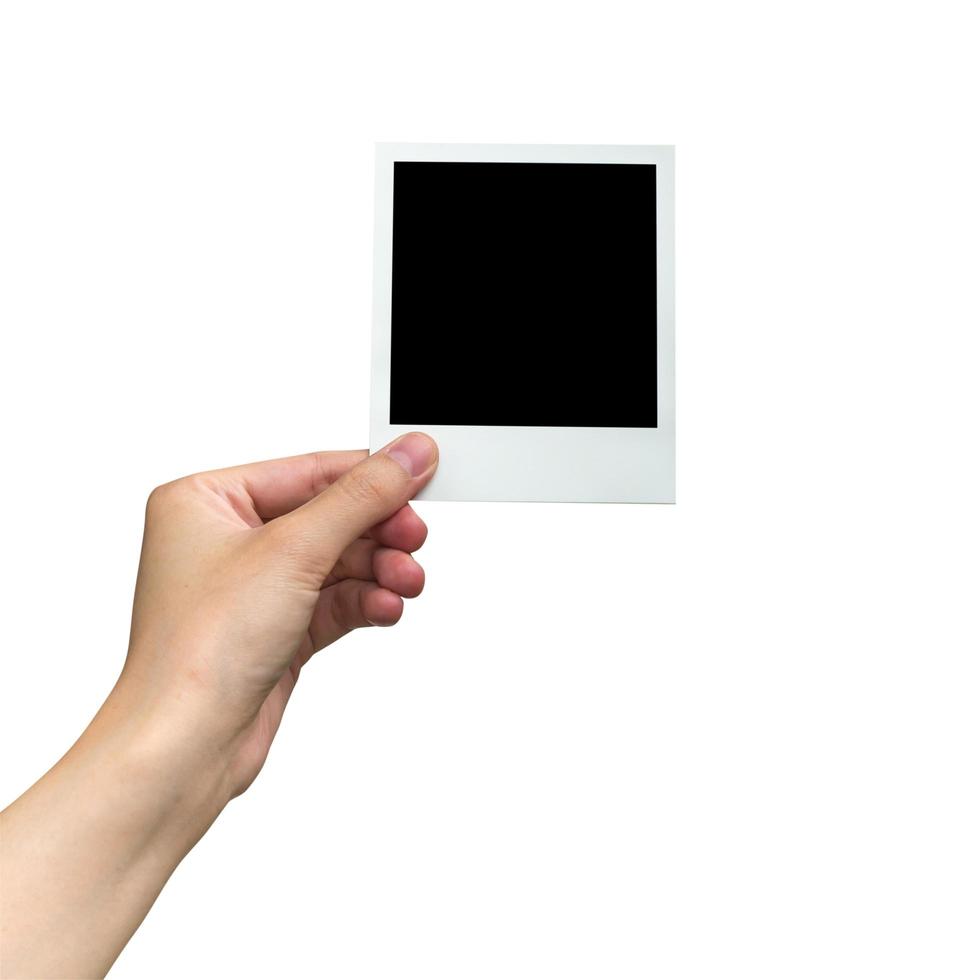 hand holding photo frame on isolated white with clipping path.