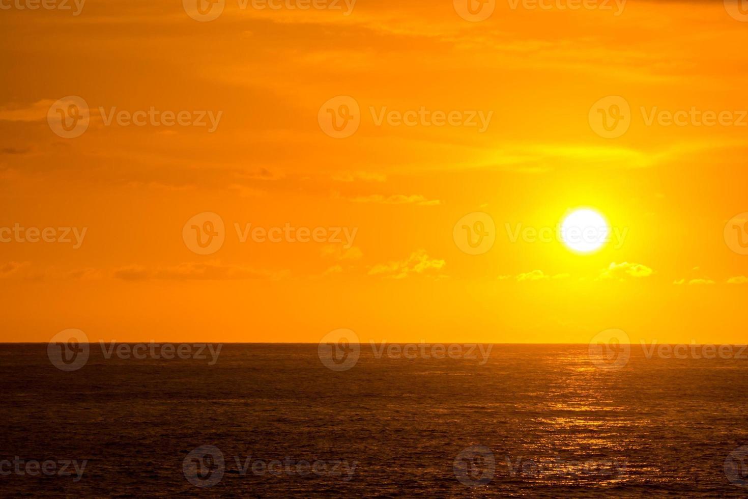 Sunset over the sea photo