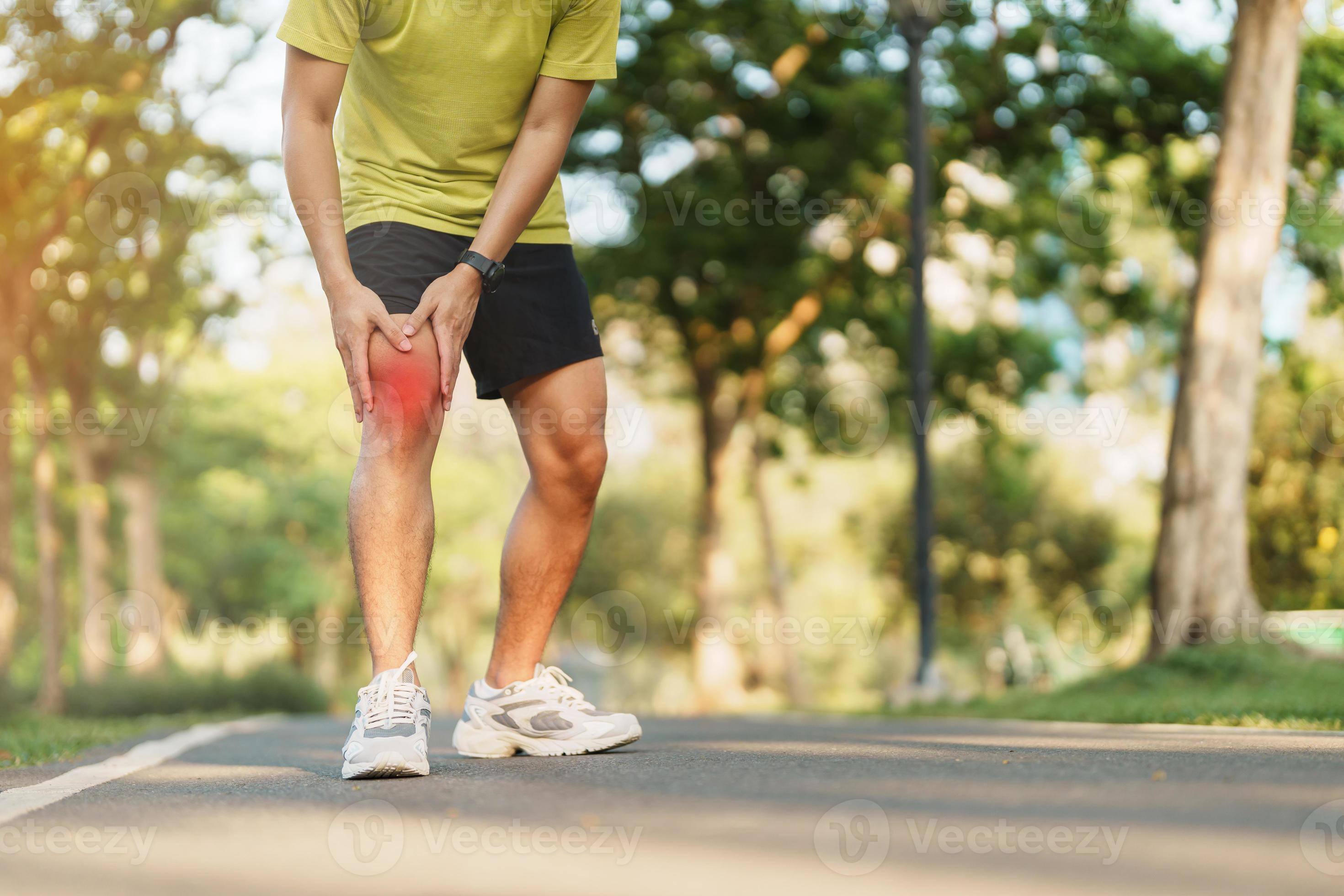 Young adult male with muscle pain during running. runner have knee ache