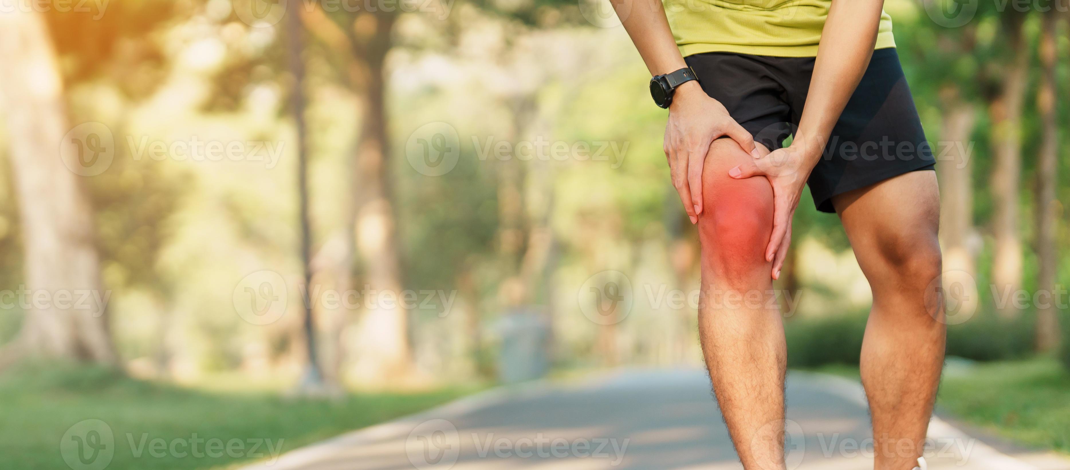 Young adult male with muscle pain during running. runner have knee ache
