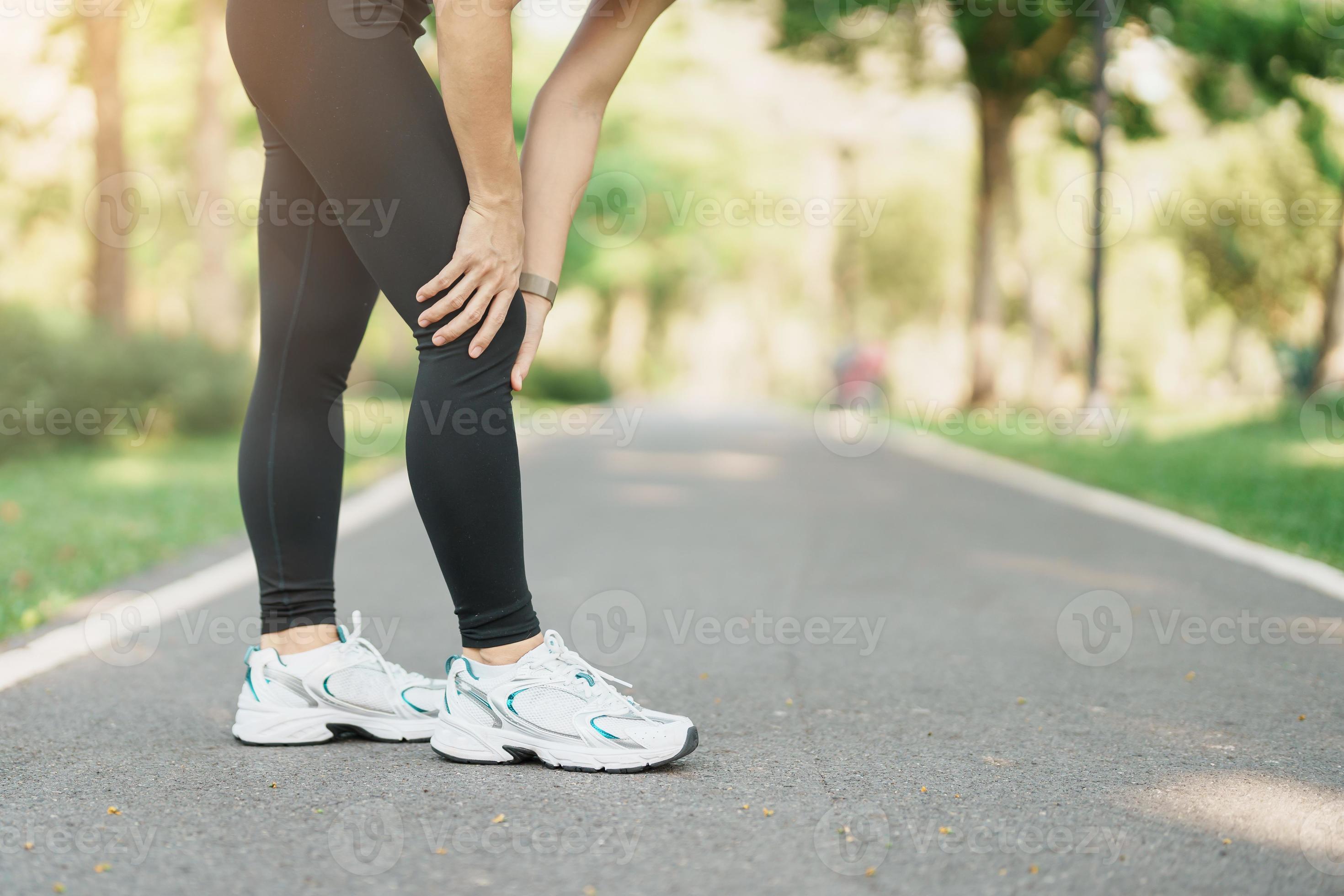 adult woman with muscle pain during running. runner have knee ache due