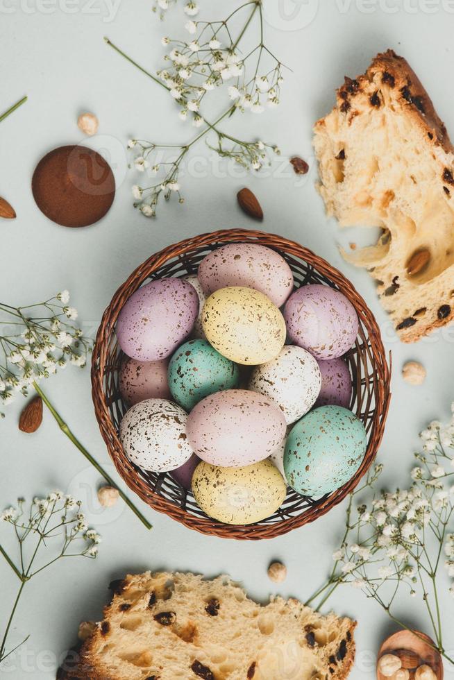 Pastel Easter eggs background. Spring greating card. Easter eggs in basket photo