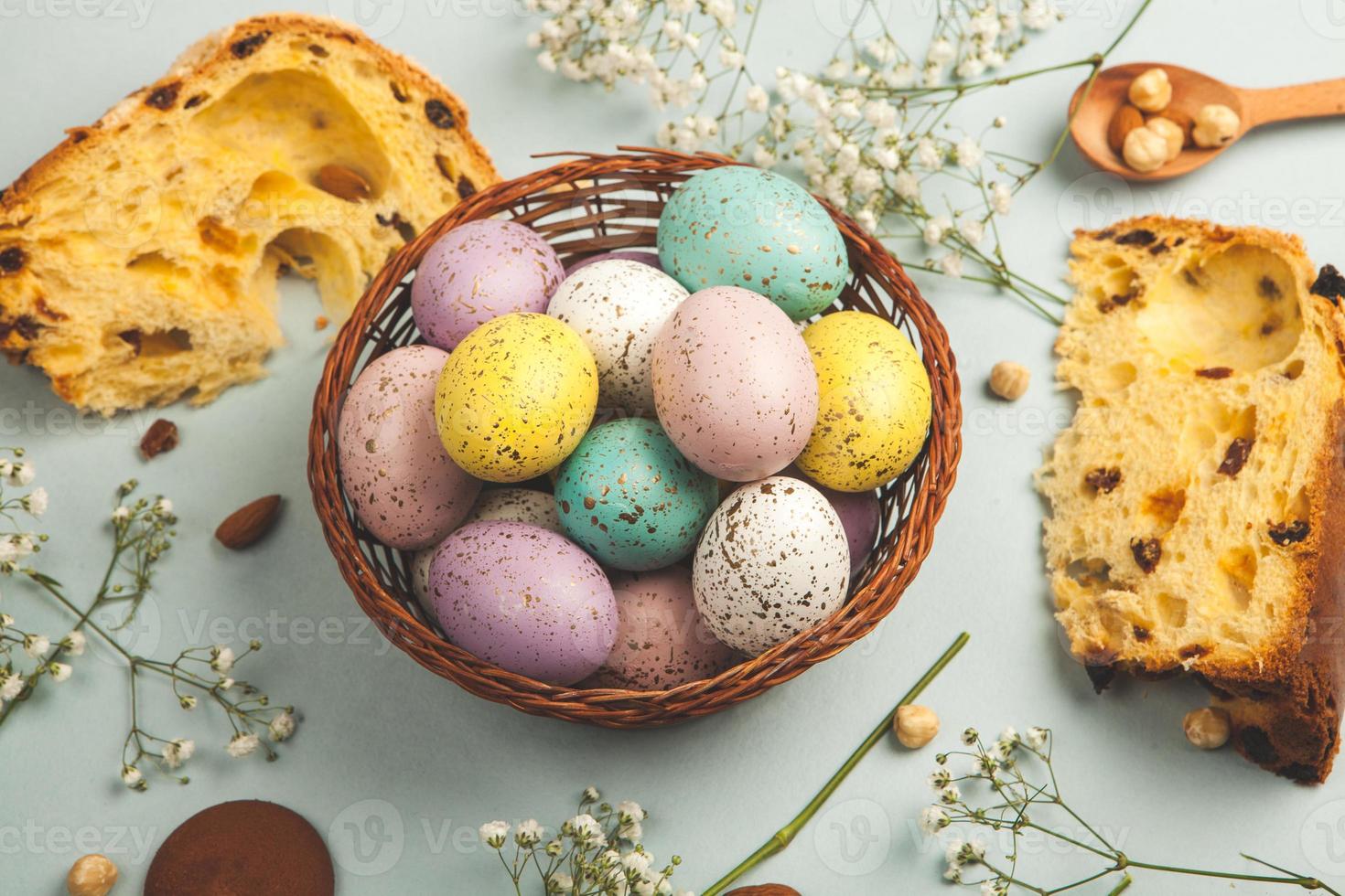 Pastel Easter eggs background. Spring greating card. Easter eggs in basket photo