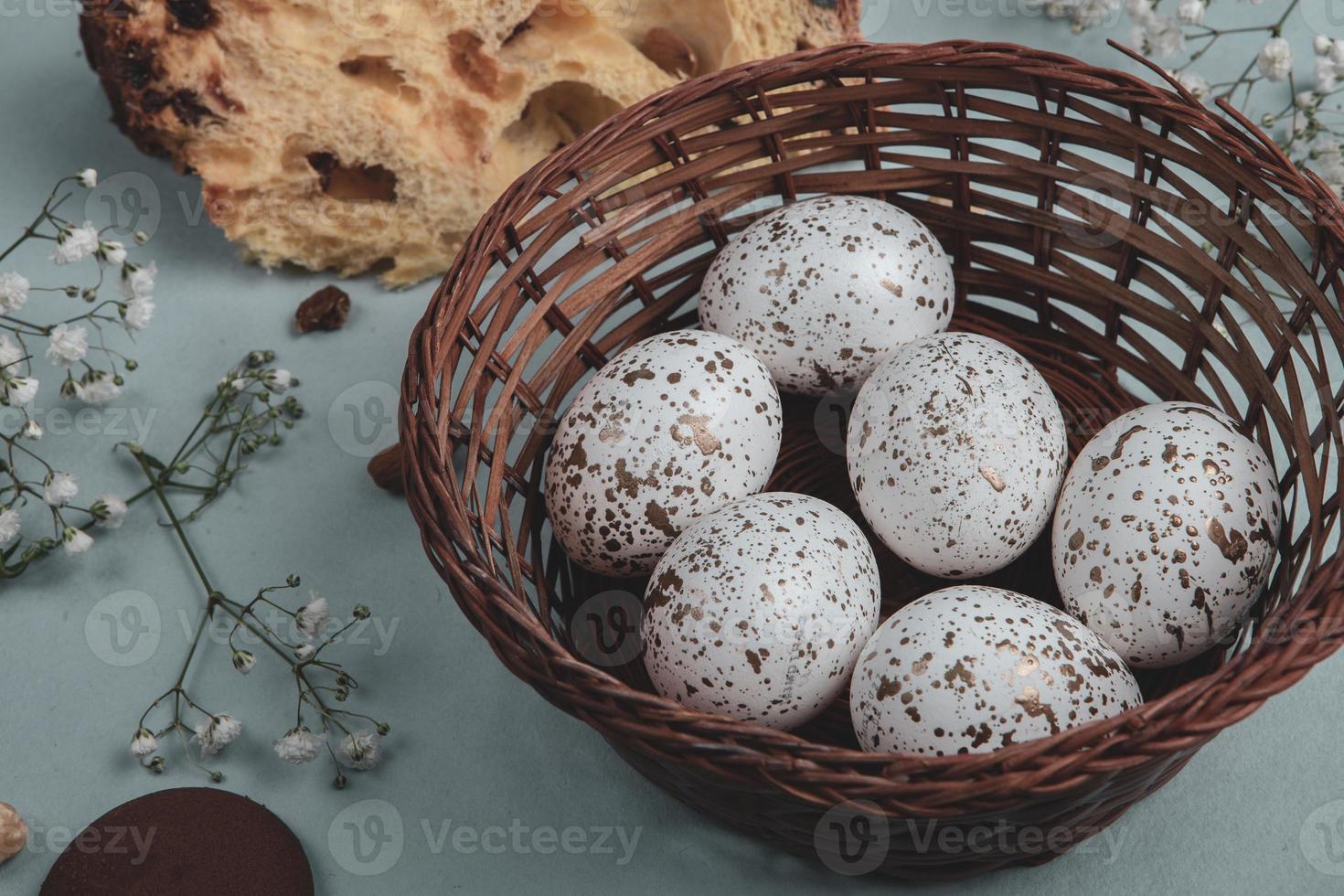 Pastel Easter eggs background. Spring greating card. Easter eggs in basket photo