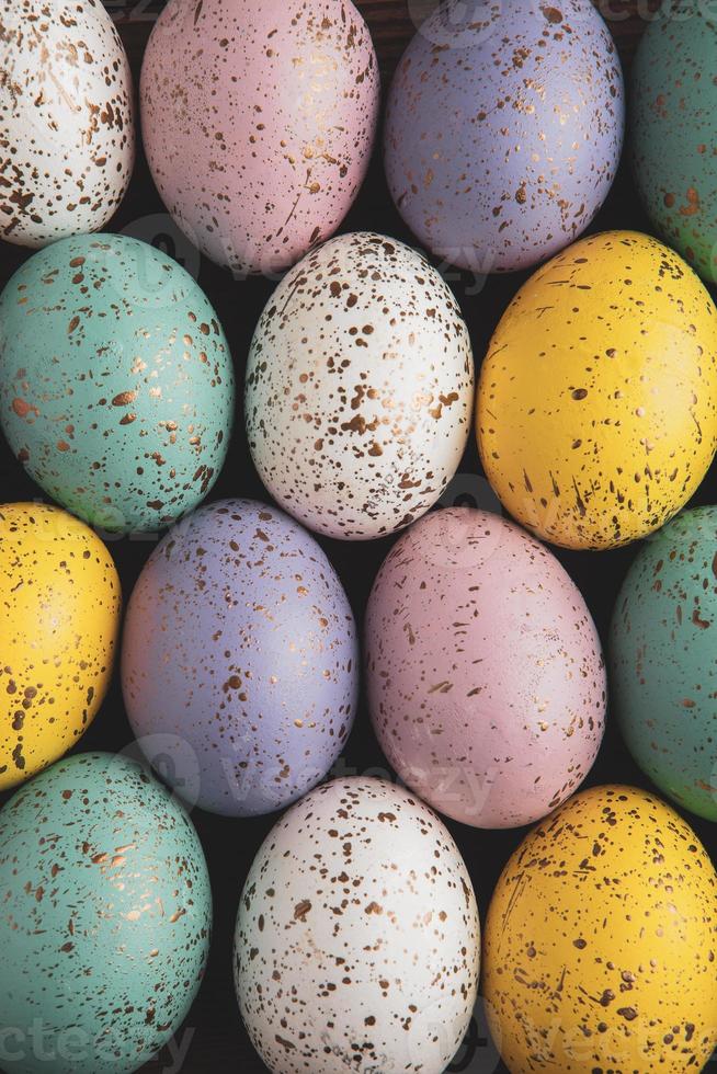 Pastel Easter eggs background. Spring greating card. Easter eggs in basket photo