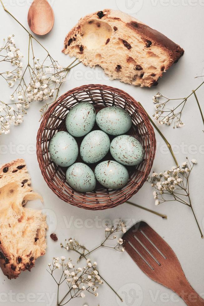Pastel Easter eggs background. Spring greating card. Easter eggs in basket photo