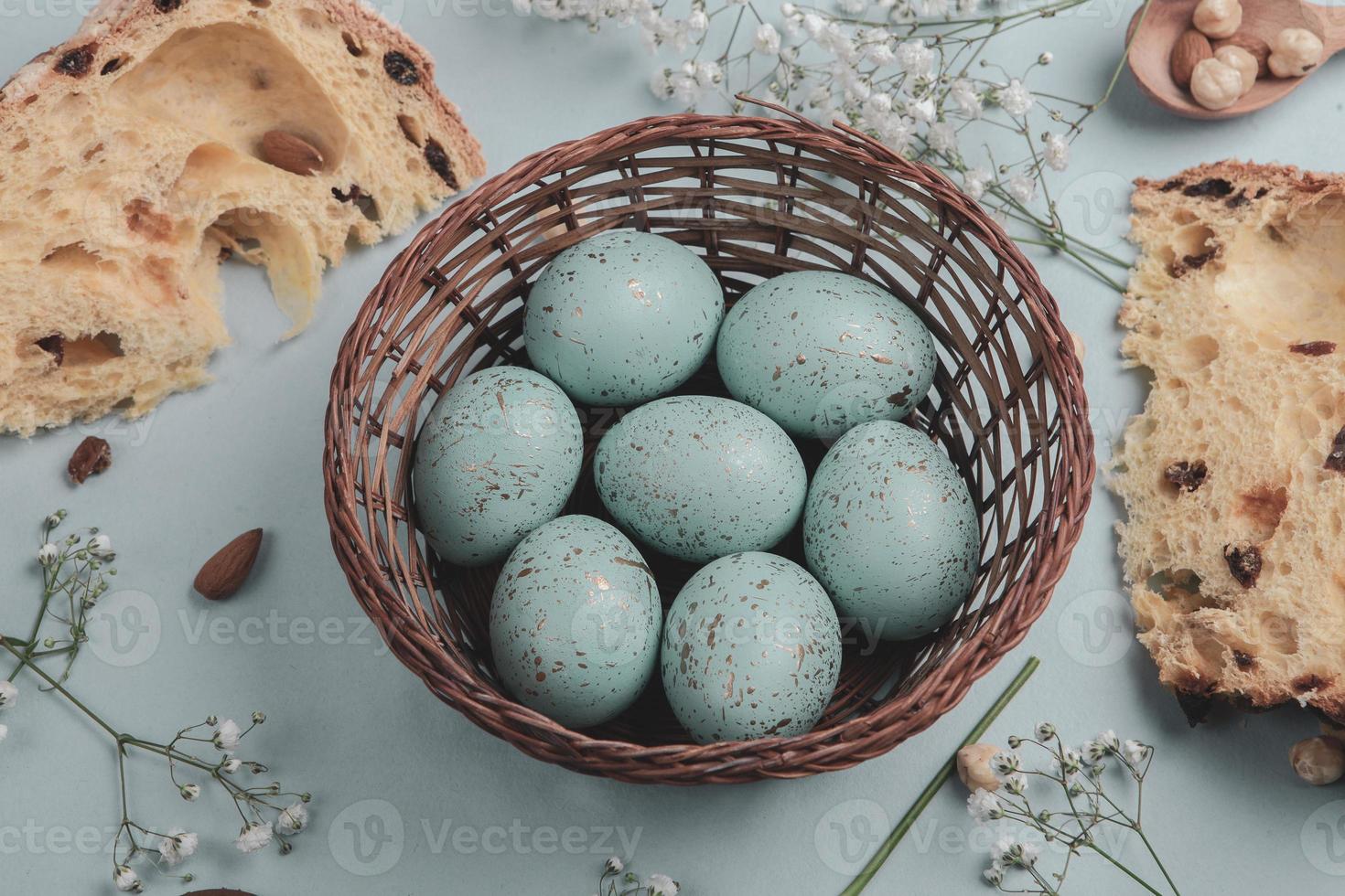 Pastel Easter eggs background. Spring greating card. Easter eggs in basket photo