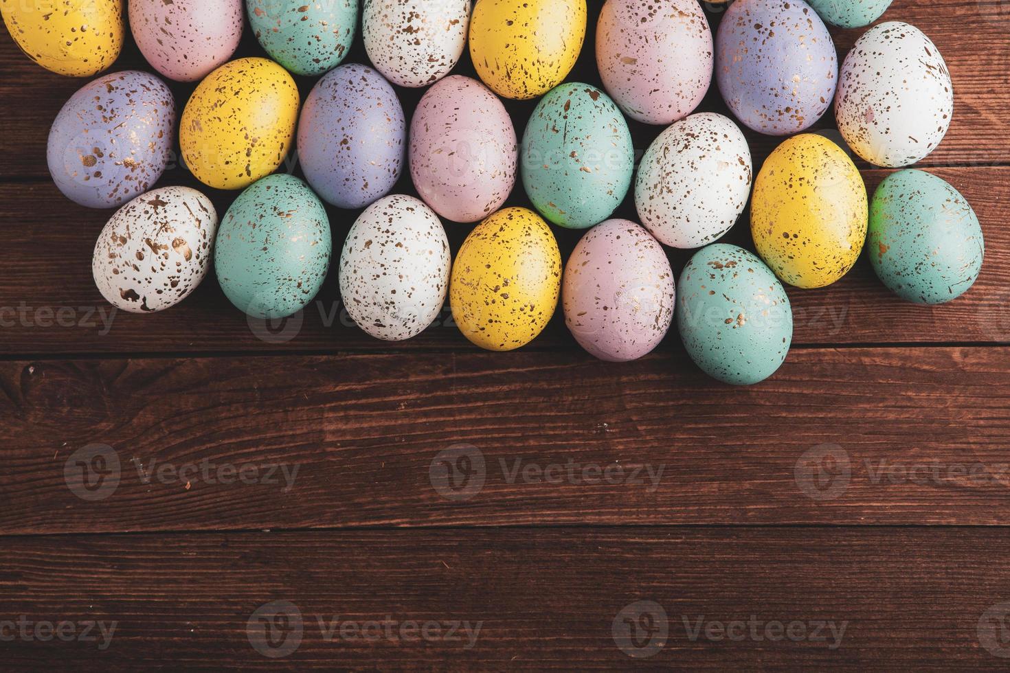 Pastel Easter eggs background. Spring greating card. Easter eggs in basket photo