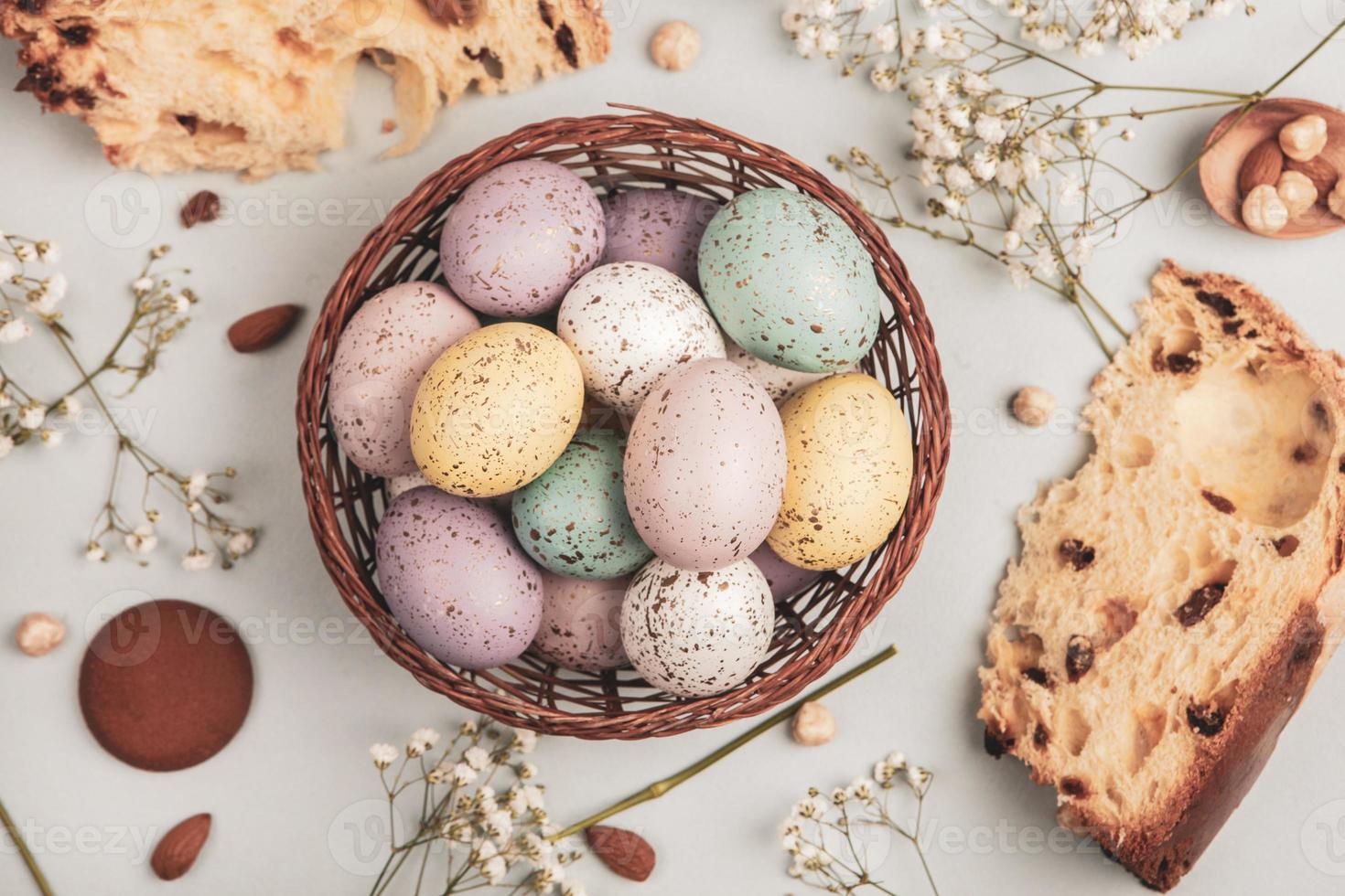 Pastel Easter eggs background. Spring greating card. Easter eggs in basket photo