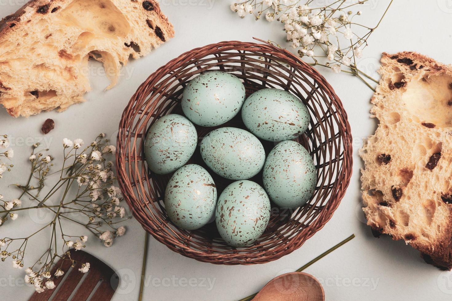 Pastel Easter eggs background. Spring greating card. Easter eggs in basket photo