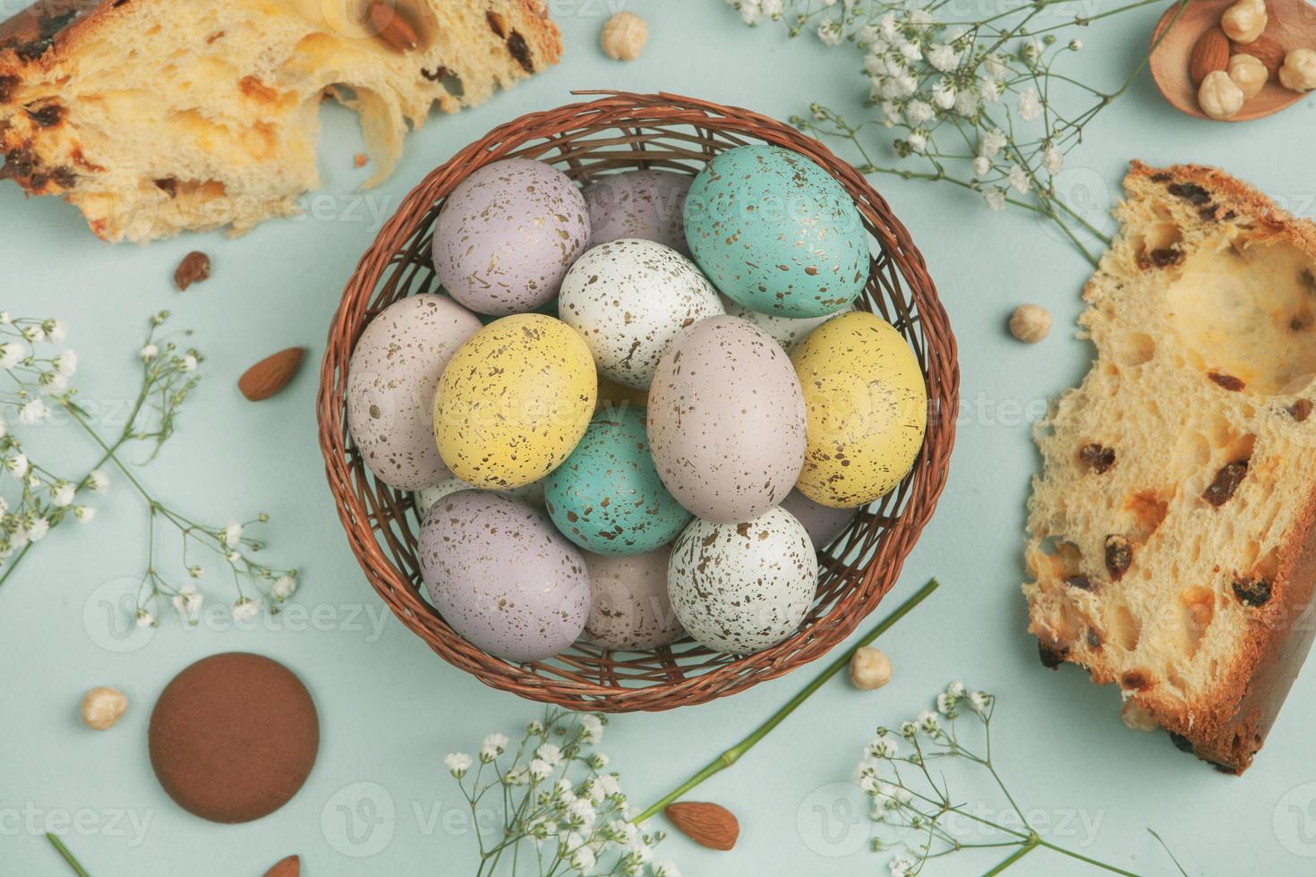 Pastel Easter eggs background. Spring greating card. Easter eggs in basket photo