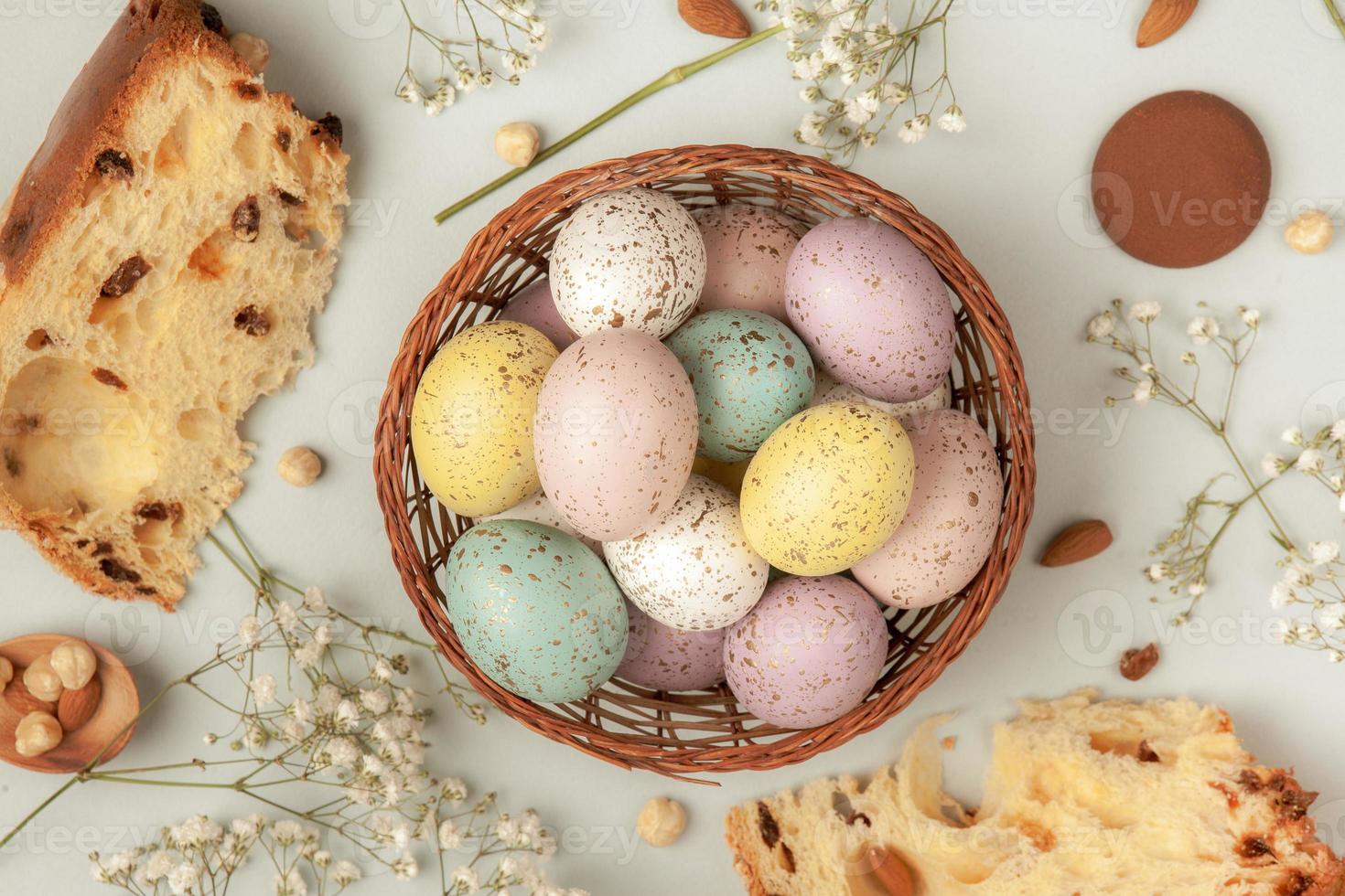 Pastel Easter eggs background. Spring greating card. Easter eggs in basket photo