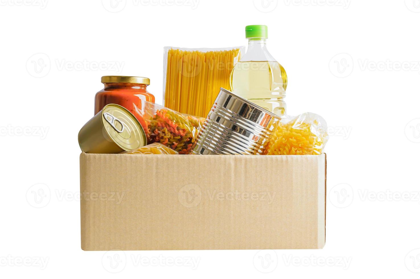 Foodstuffs in donation box isolated on white background with clipping path for volunteer to help people. photo