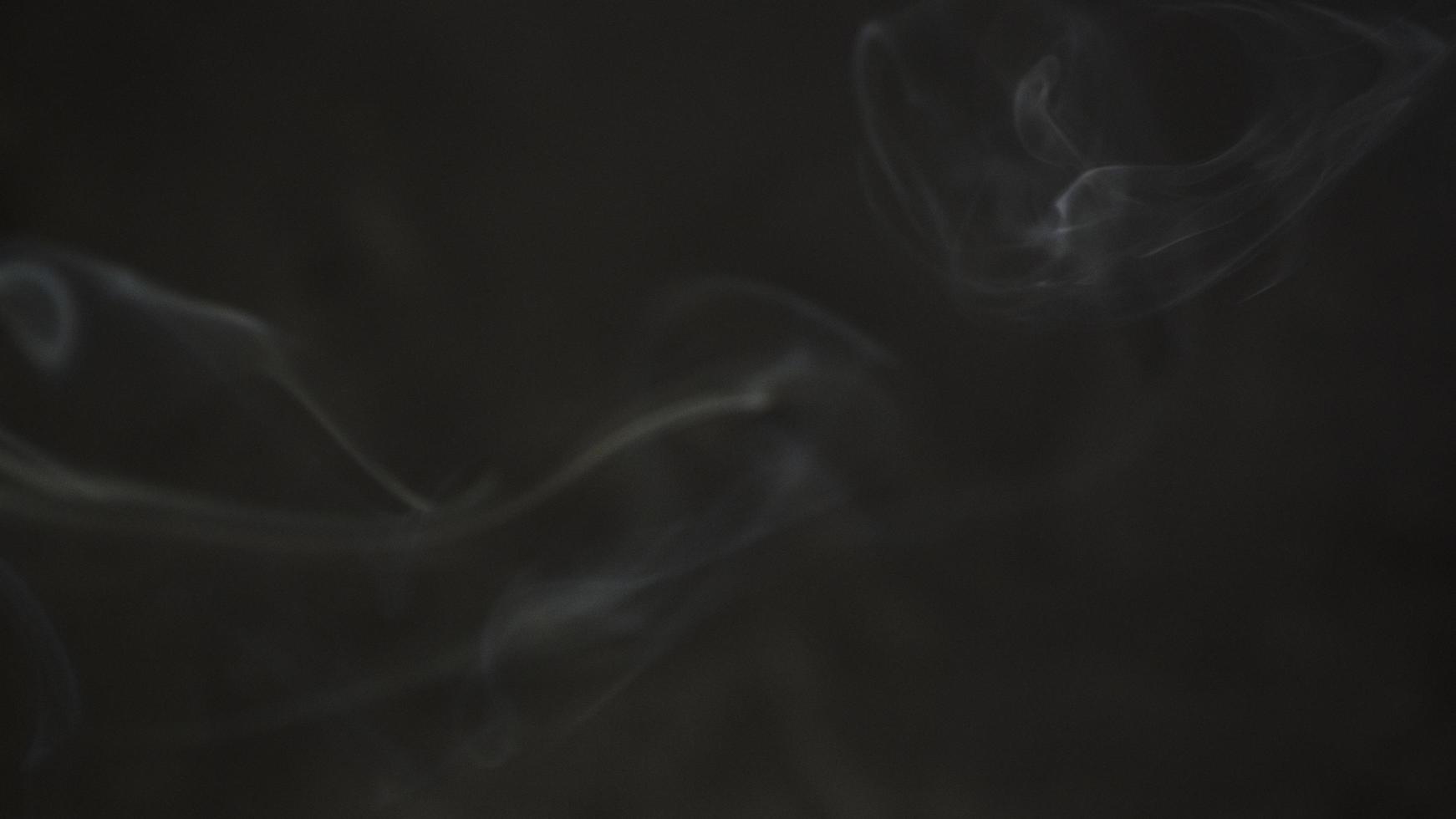 Blurred background for text or design. Blurred abstract smoke pattern. Monochrome picture. Black and white abstract design. photo