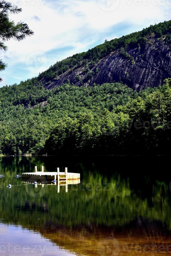Diving dock in mountain lake western North Carolina photo