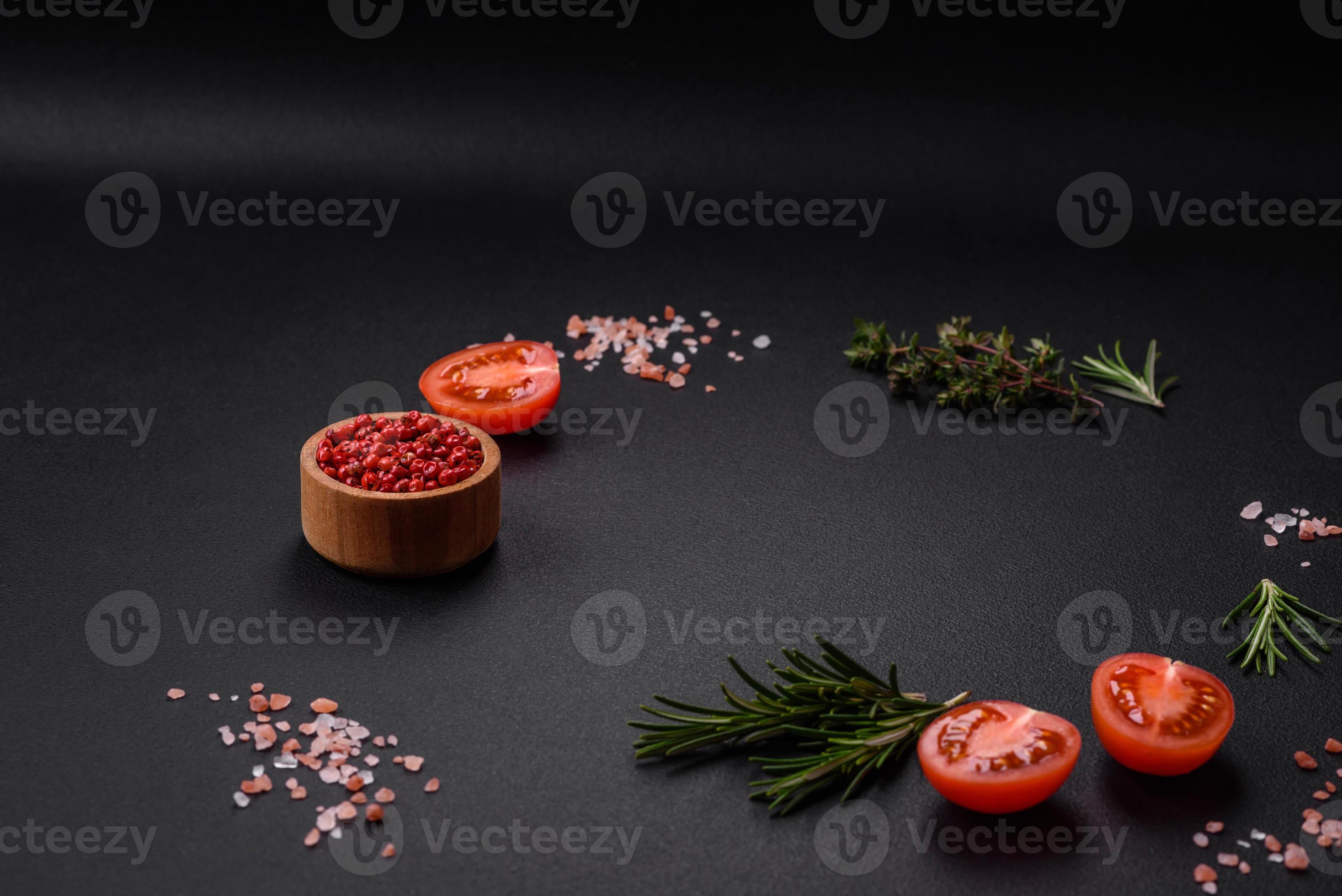 Rosemary, thyme, allspice, salt, cherry tomatoes and other spices and