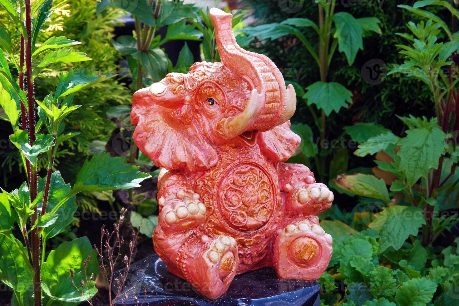 Ceramic elephant figure for garden decoration photo