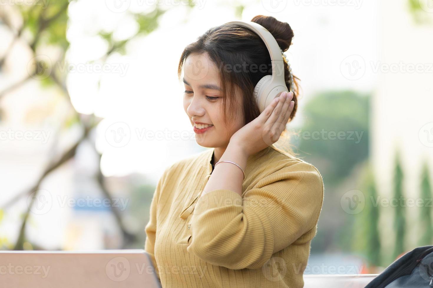 Portrait of a beautiful Asian female student at university photo