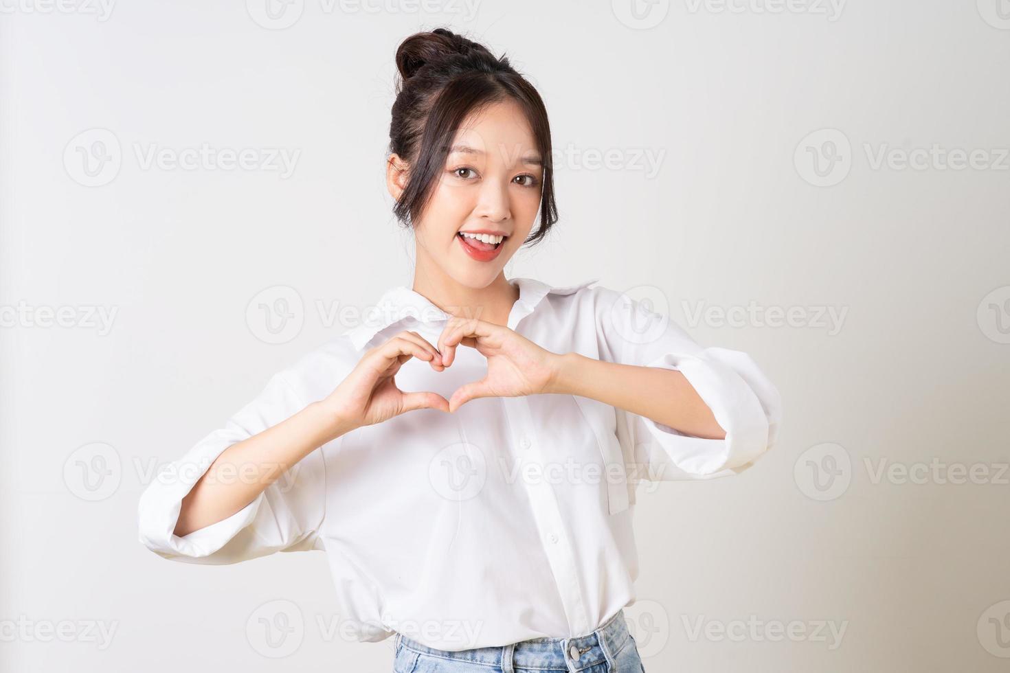 beautiful young asian businesswoman portrait on white background photo