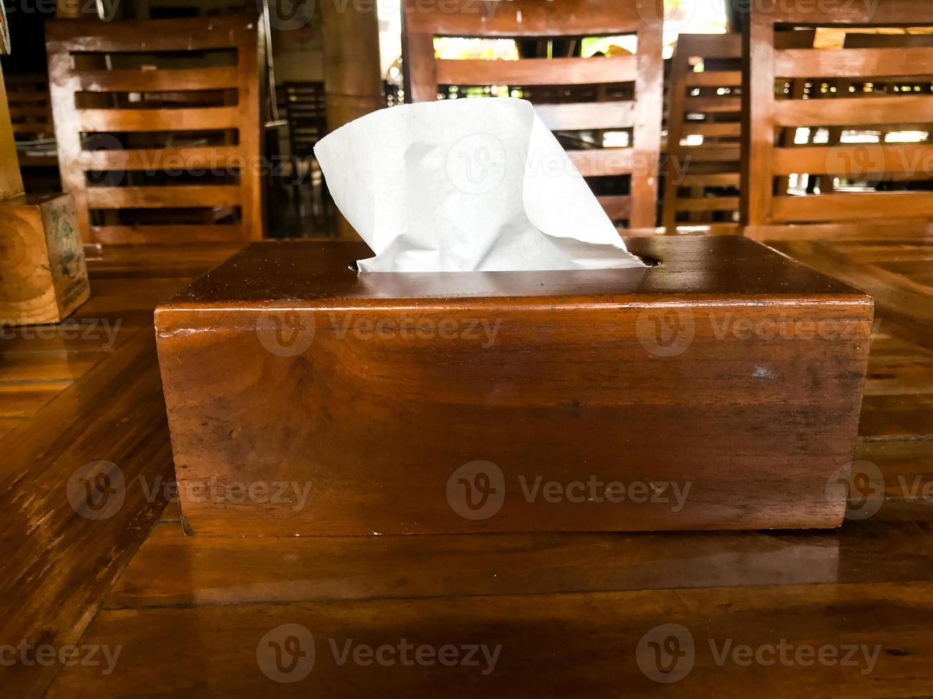 Wooden tissue box on the table photo