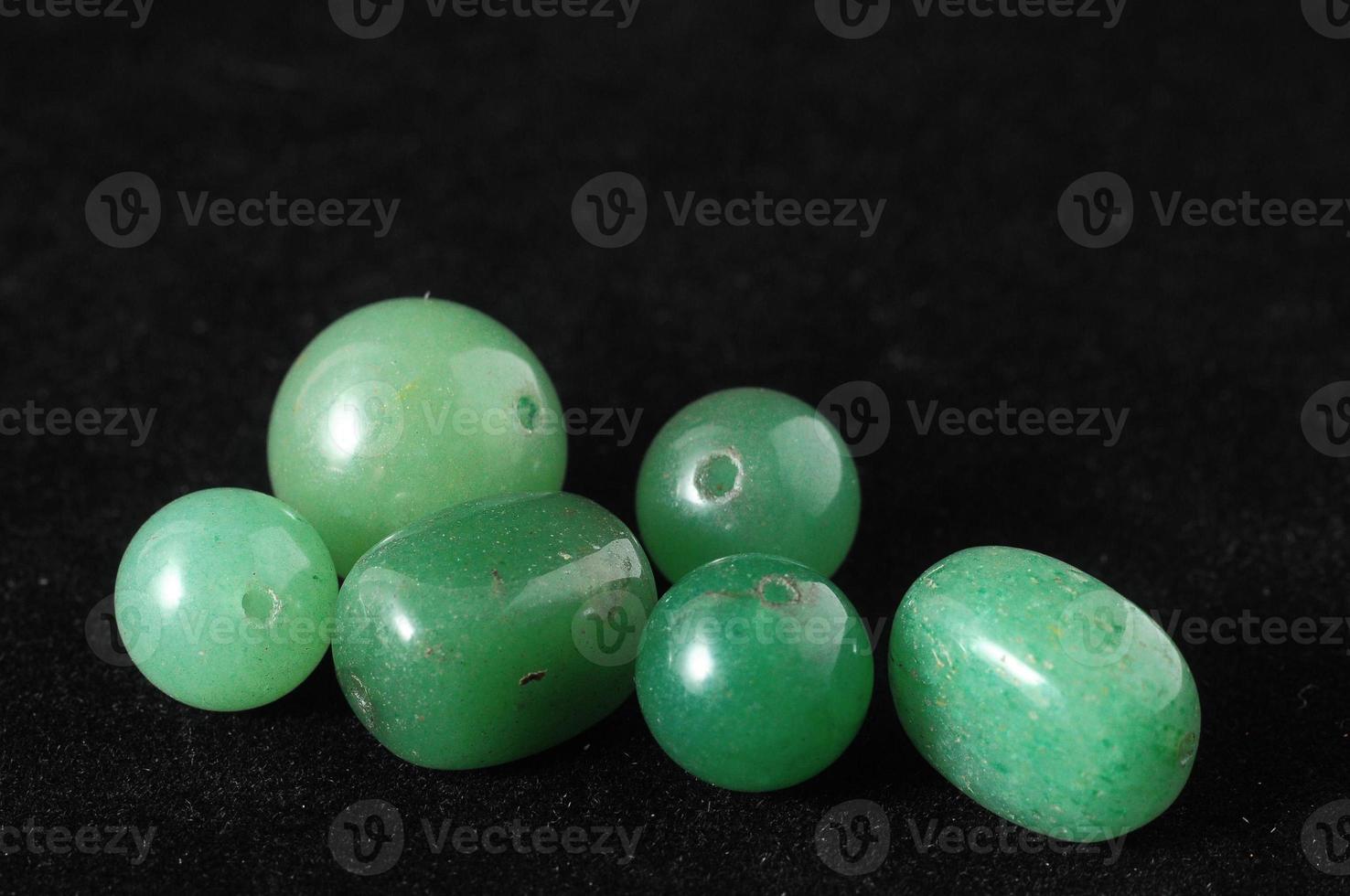 Gemstones on dark background photo