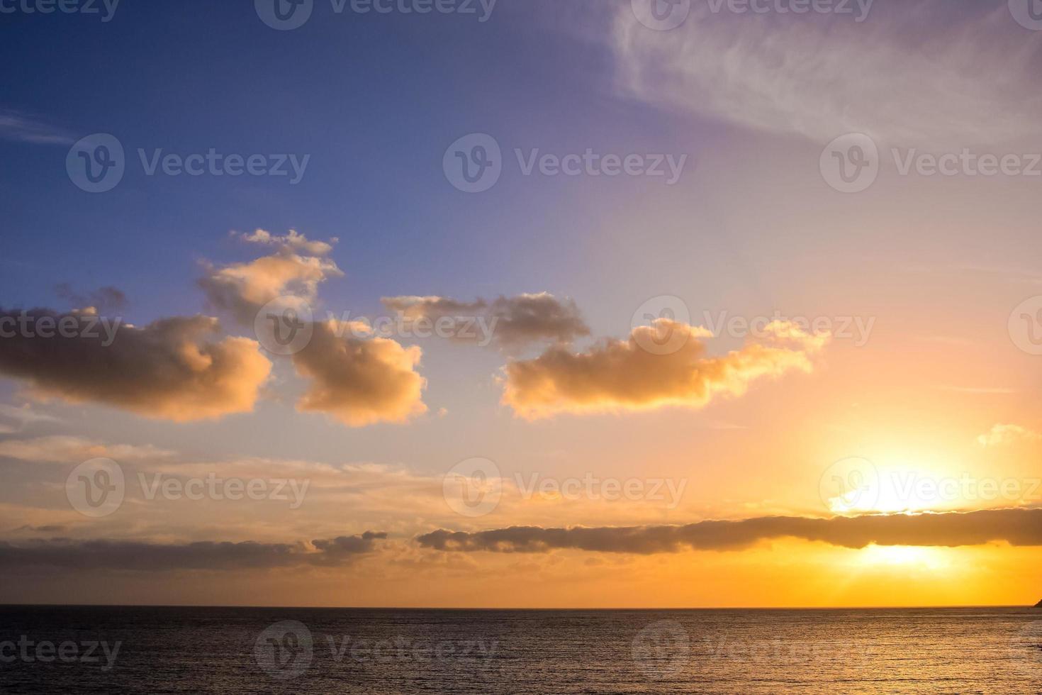 Sunset over the sea photo