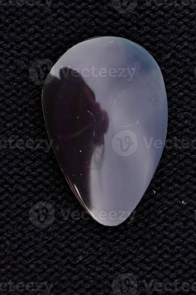 Gemstones on dark background photo